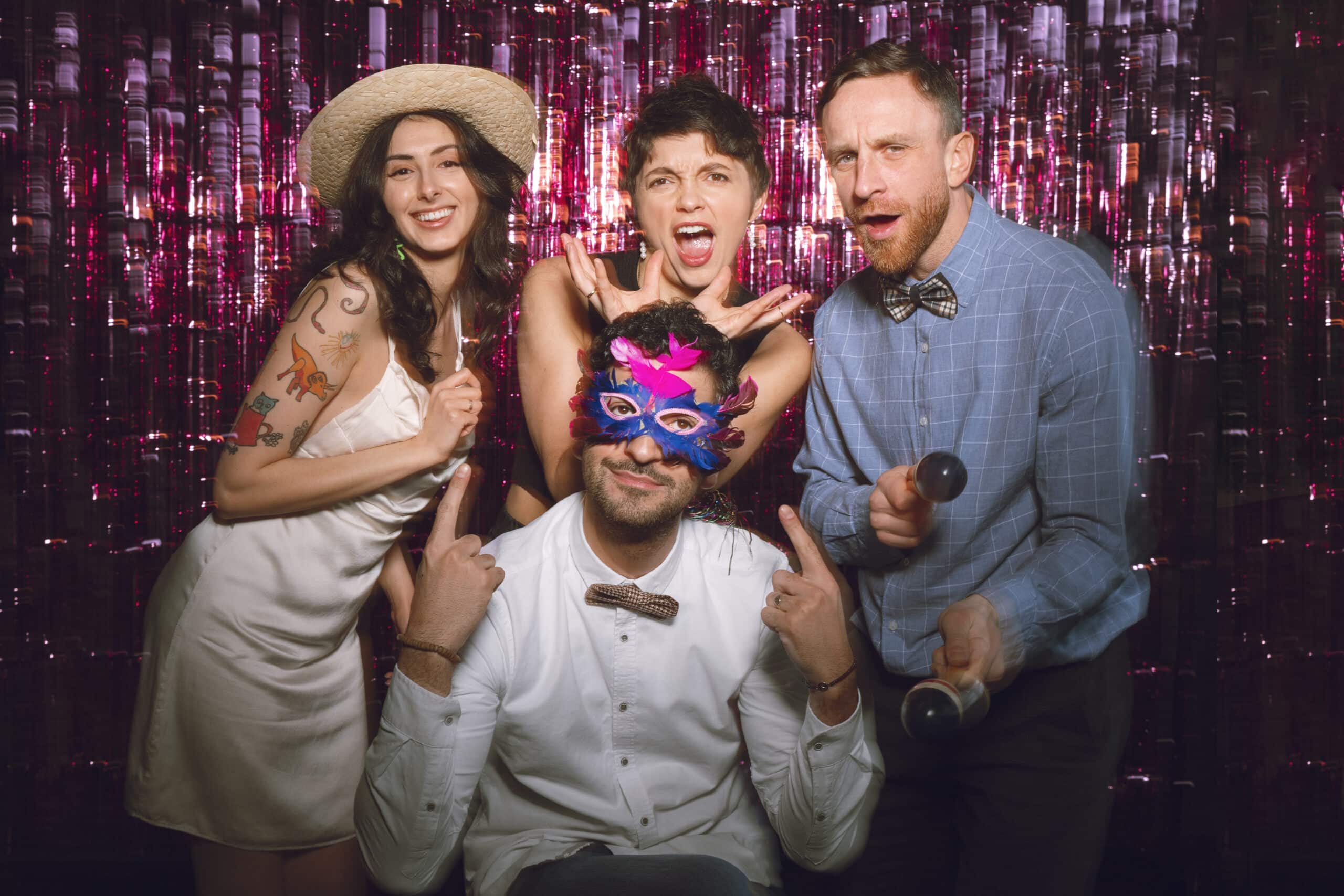 medium-shot-friends-posing-together-photobooth medium-shot-friends-posing-together-photobooth